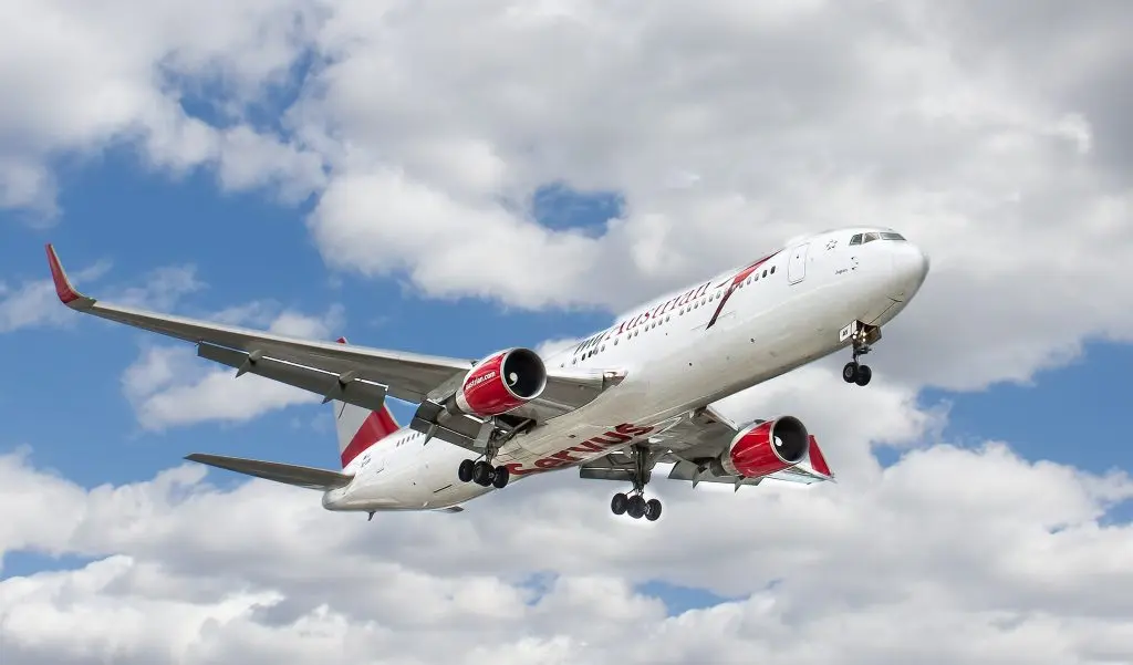 Austrian Airlines Boeing aircraft on approach to landing.